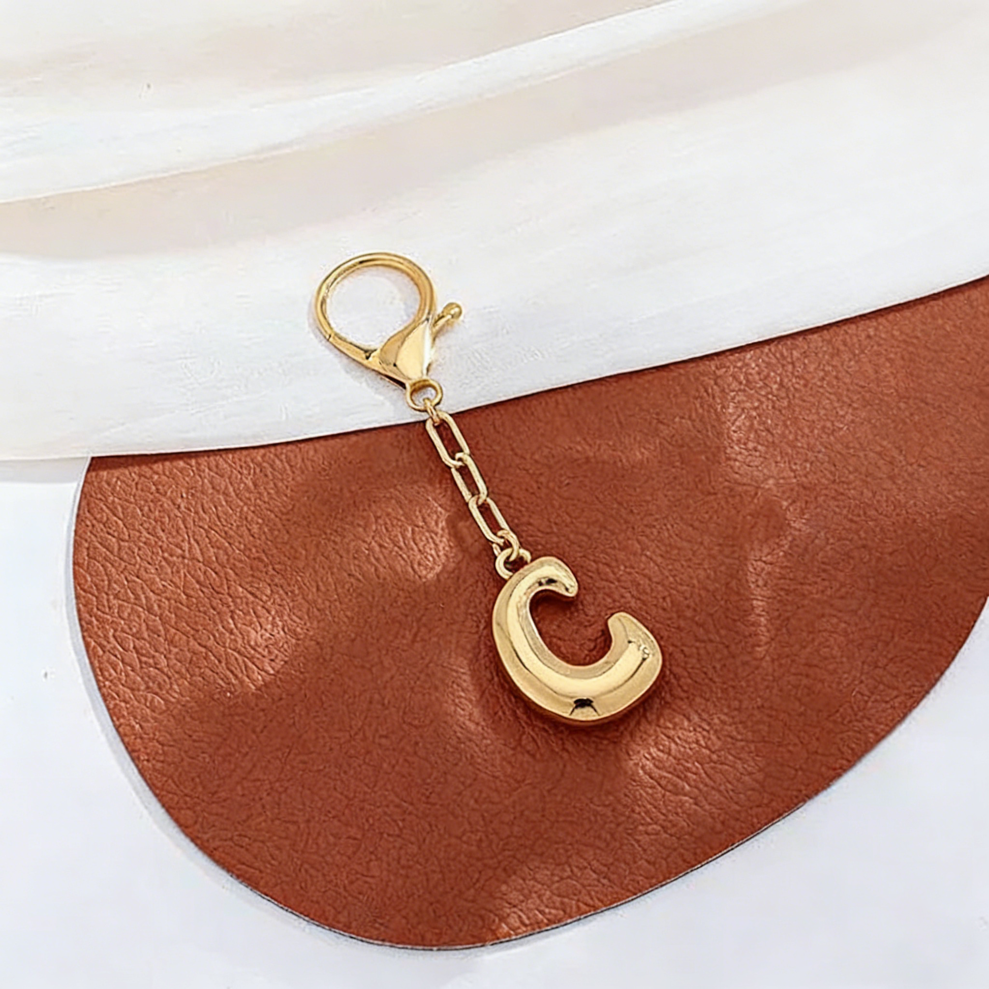 Metal letter pendant