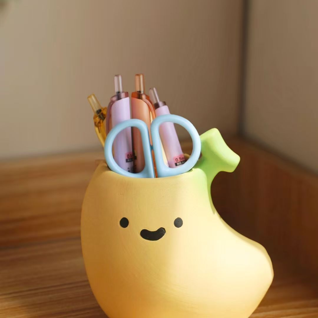 Smiling Banana Ceramic Pen Holder, Playful Desktop Pencil Cup and Makeup Brush Organizer for Home Office Decor