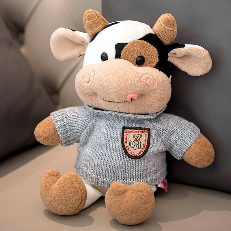 Cozy Cow Plush Toy, 30 cm Black-and-White Calf in Six Outfits for Nursery Shelves and Animal Lover Gifts