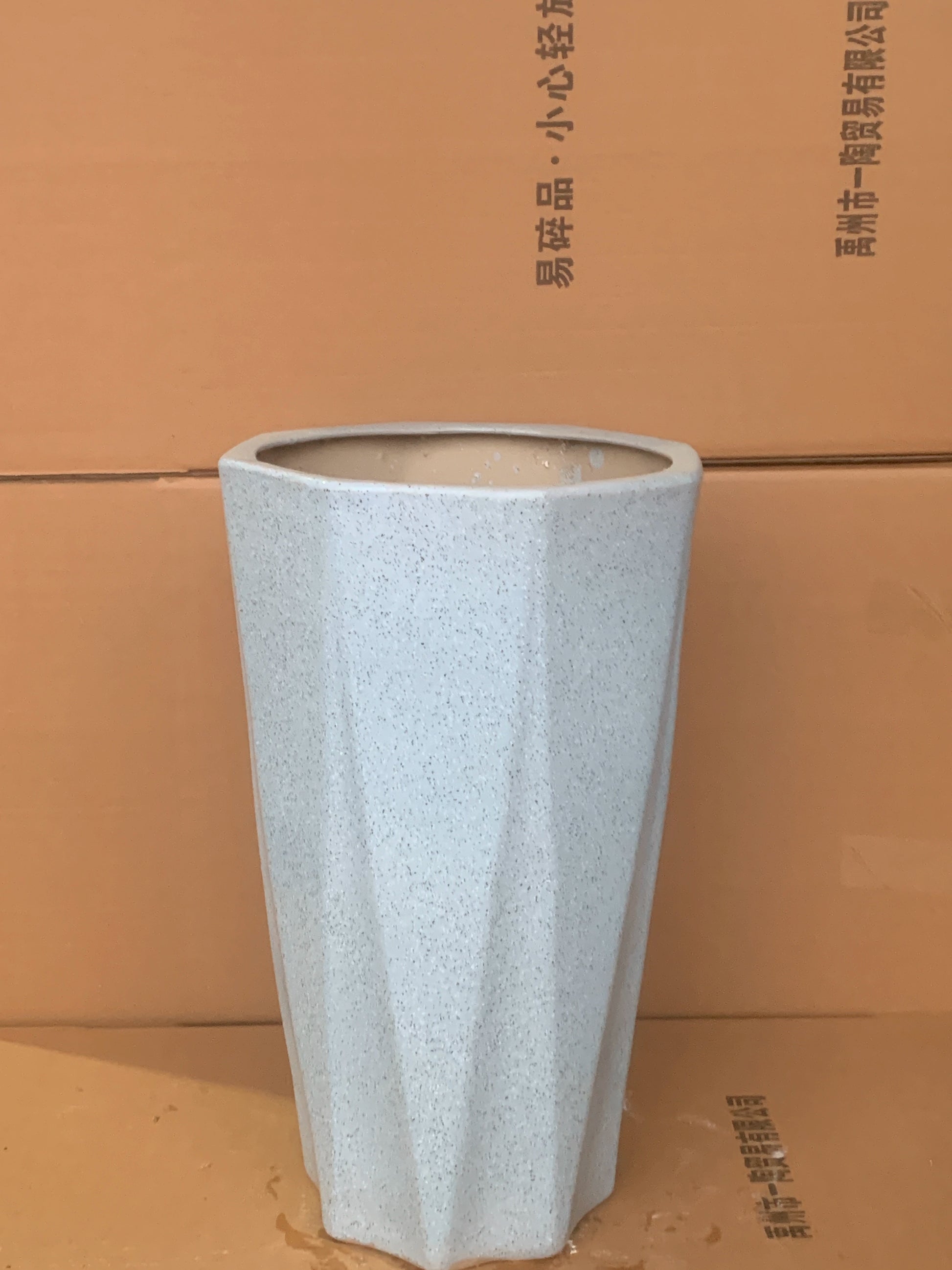 Modern minimalist paradise bird landing tall flowerpot