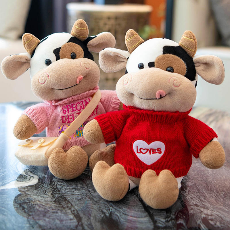 Cozy Cow Plush Toy, 30 cm Black-and-White Calf in Six Outfits for Nursery Shelves and Animal Lover Gifts