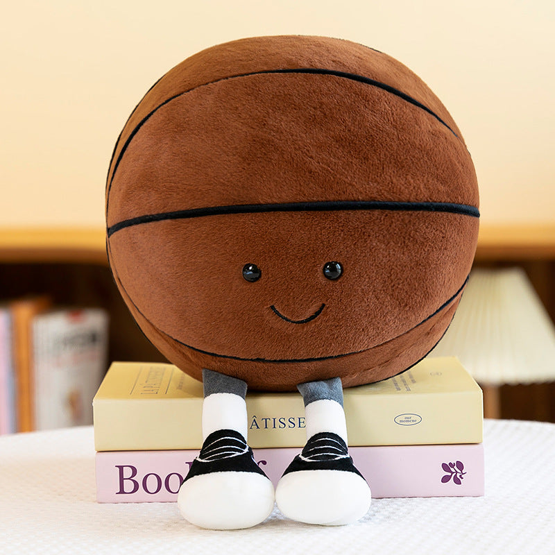 Smiling Sports Ball Plush Toy, 25 cm Soccer, Basketball or Rugby Ball with Dangling Legs for Playful Gifts and Cozy Rooms